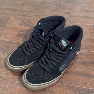 Vans Black and Tan High-Top Sneakers